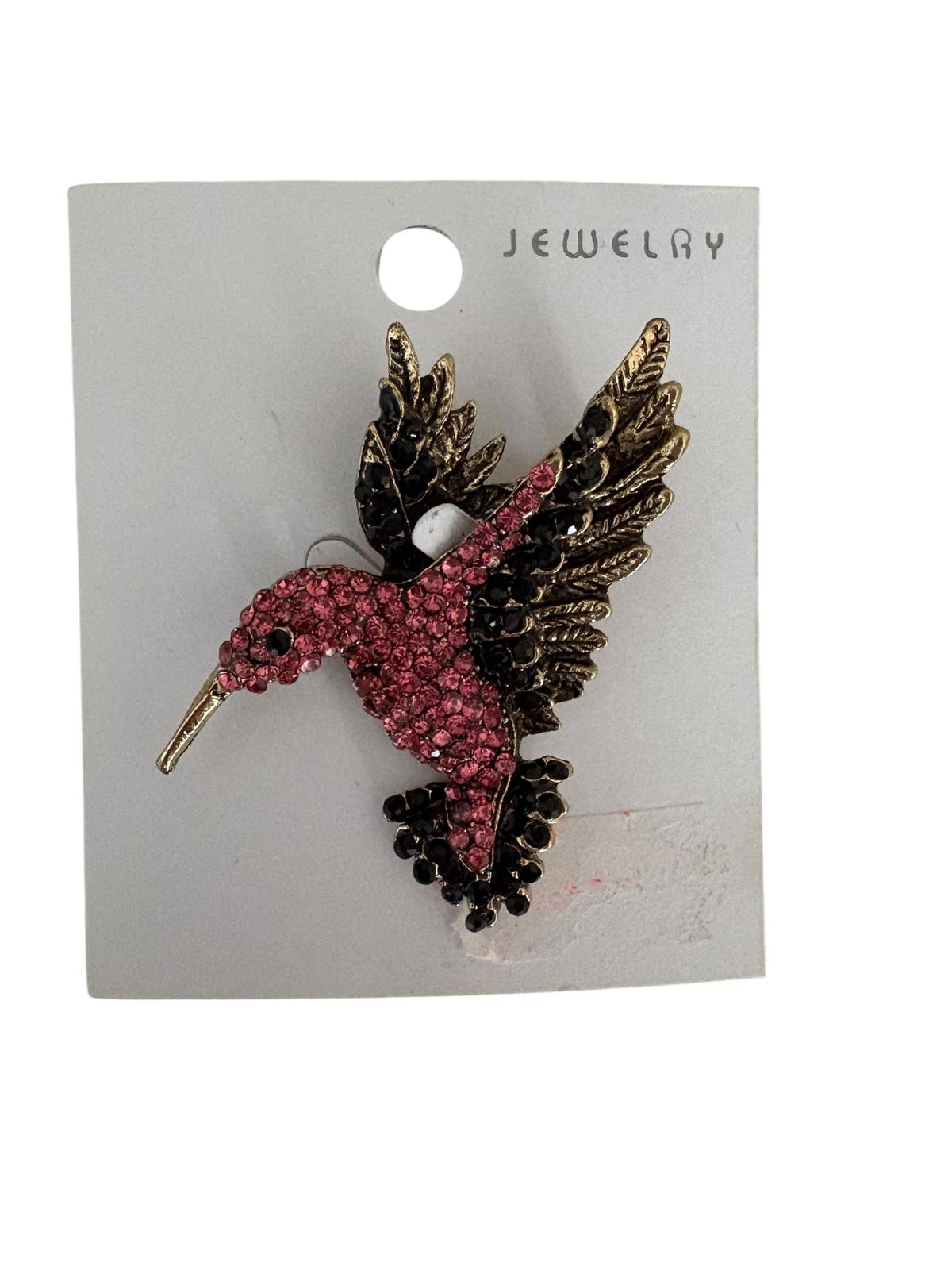 Pink crystal hummingbird brooch with gold-colored wings